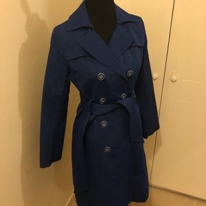 Classic blue raincoat. Fits about a size 6/8.